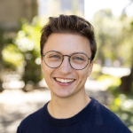 Headshot, chase, guy with glasses and blue shirt