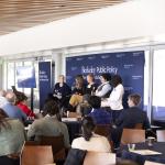 view of attendees and speakers at conference