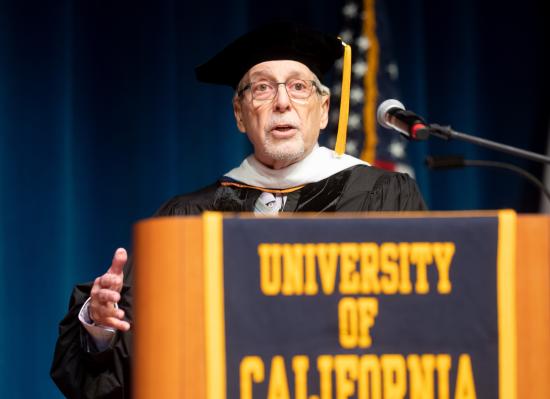 Geoff Nunberg speaking at graduation