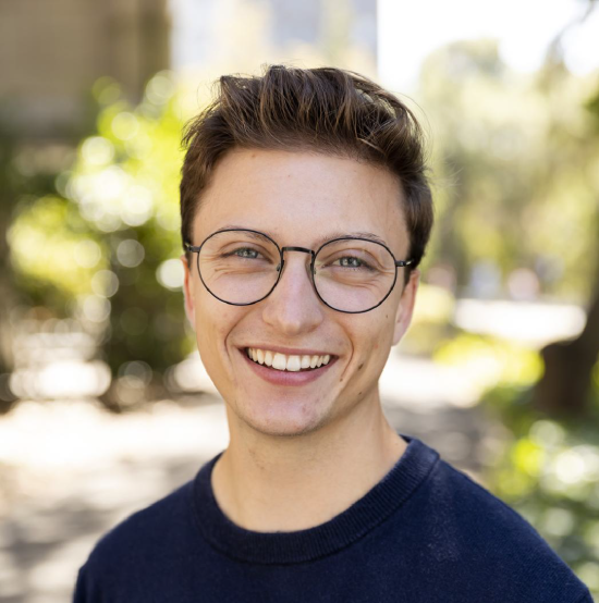 Headshot, chase, guy with glasses and blue shirt