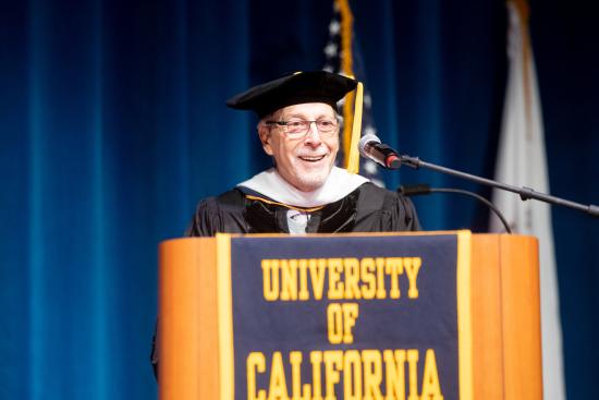 Geoff Nunberg speaking at graduation